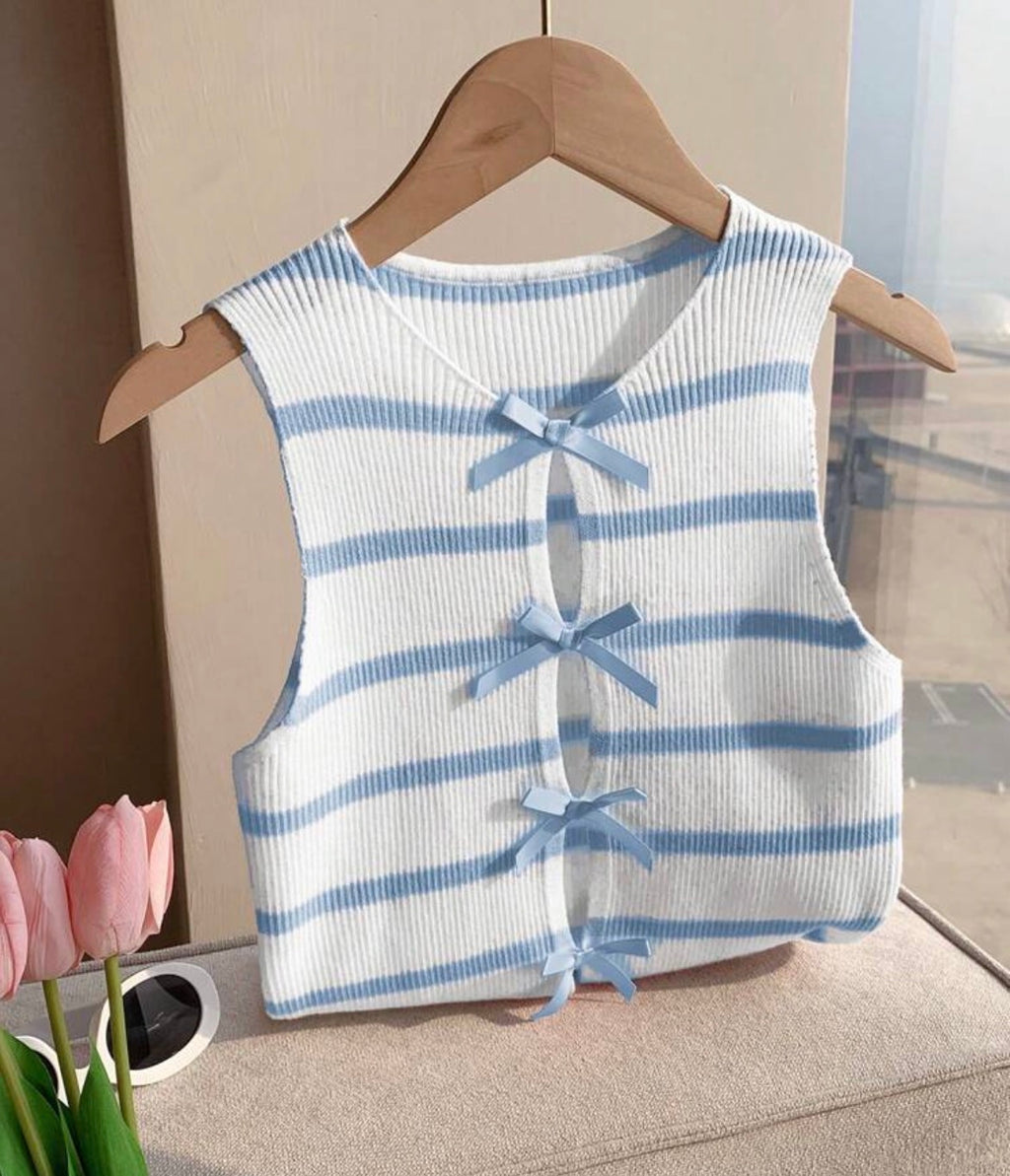 Blusa con moñitos